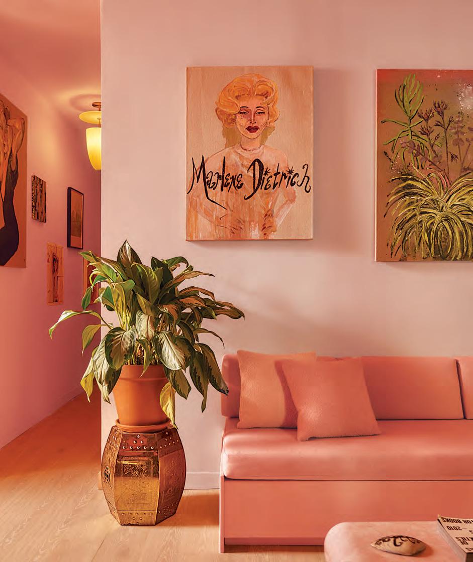 A pink, art-filled downtown interior